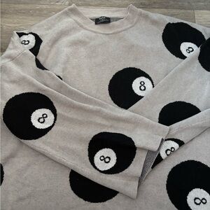 Dressed in LALA Beige and Black 8-Ball Sweater